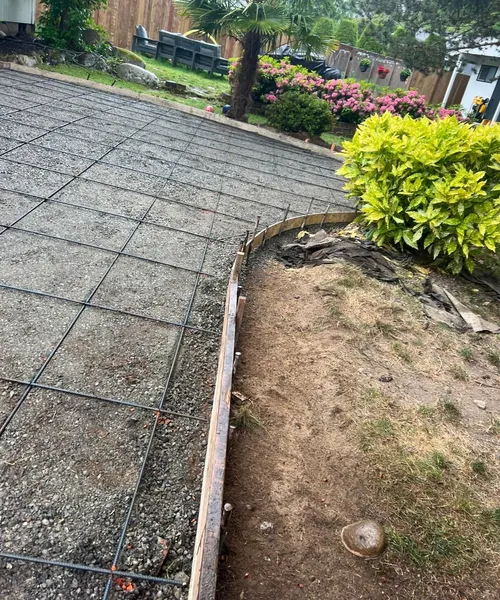 Broom finish patio and decorative borders in Covington 